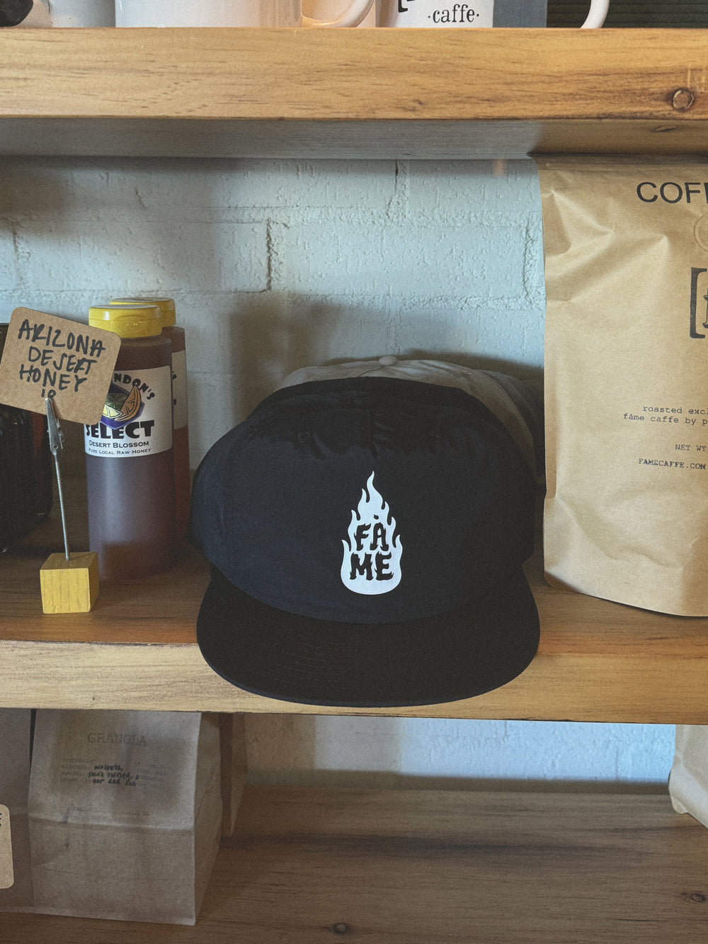 Hat decorated with a premium heat transfer on a store shelf