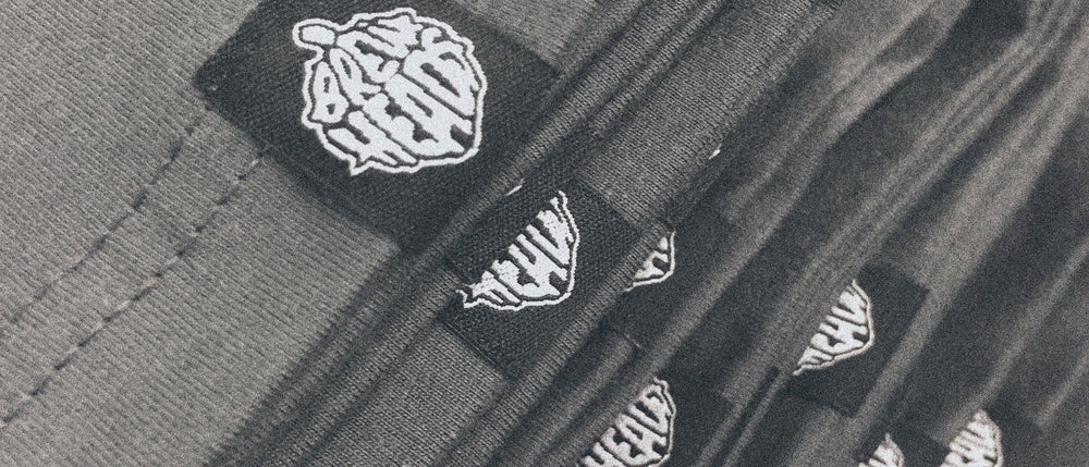 Custom woven hem tag on a garment