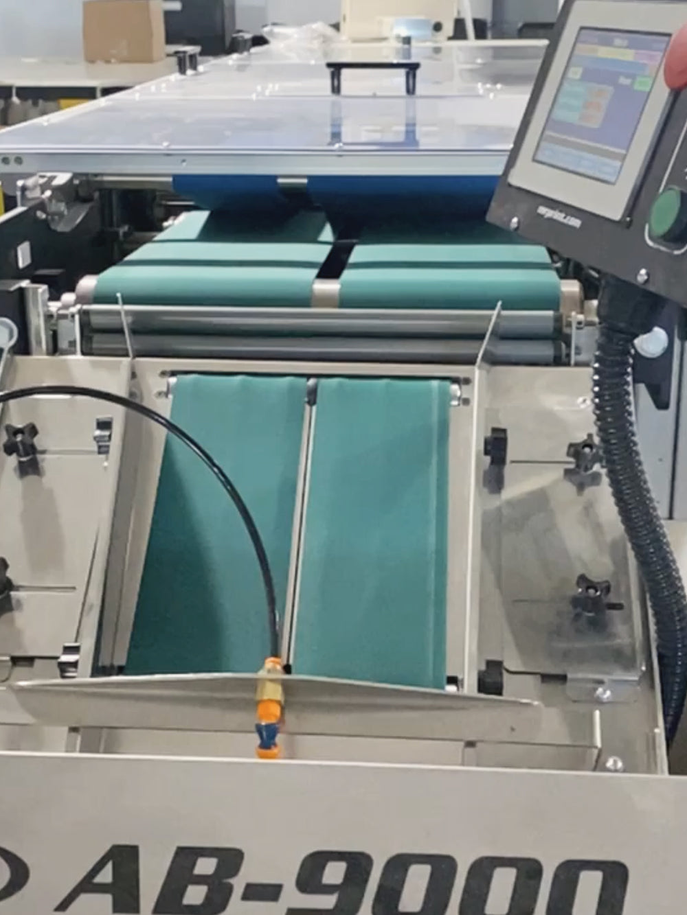 Garment folding machine in the finishing area