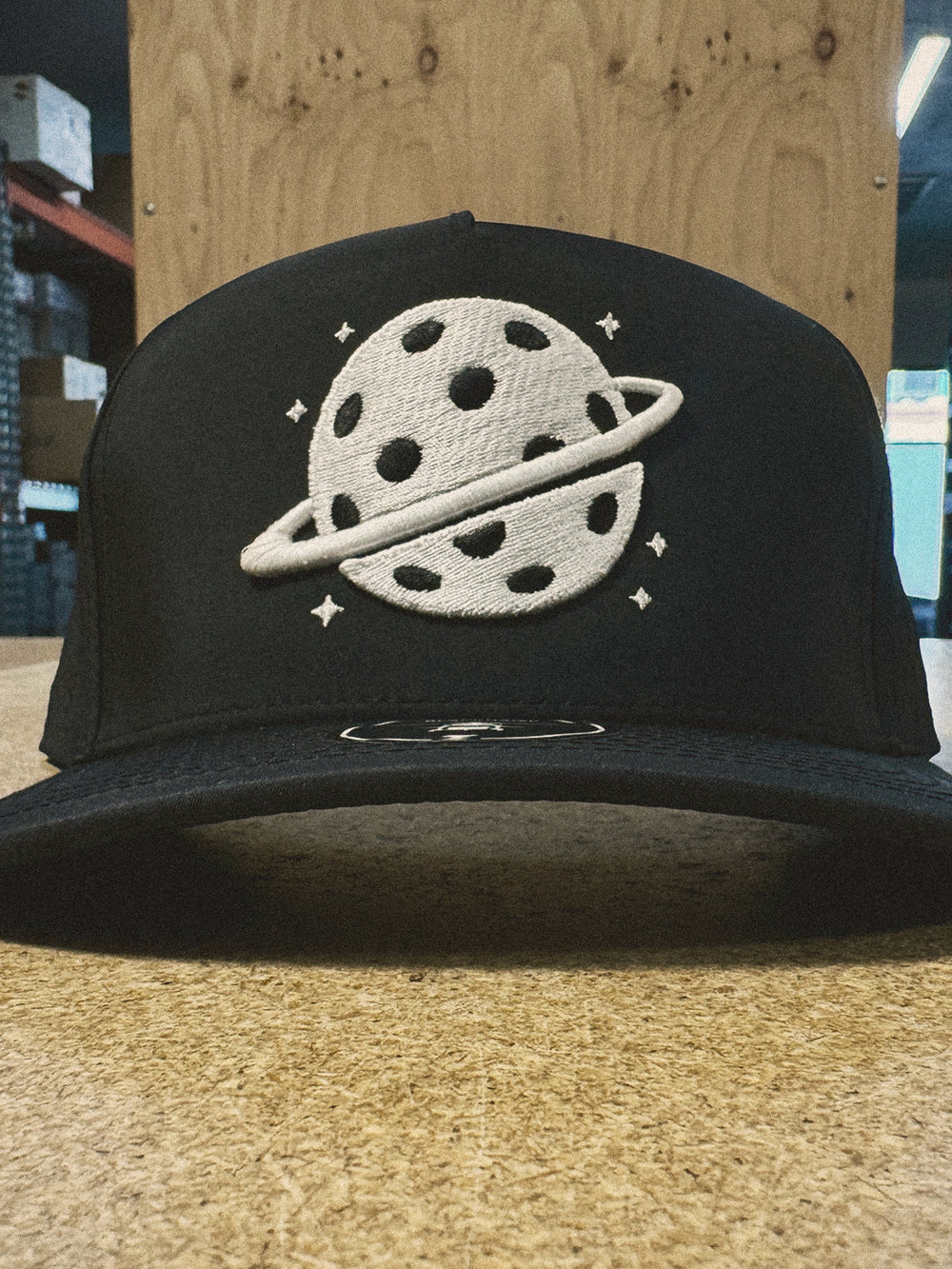 Hat with patch-style puff embroidery