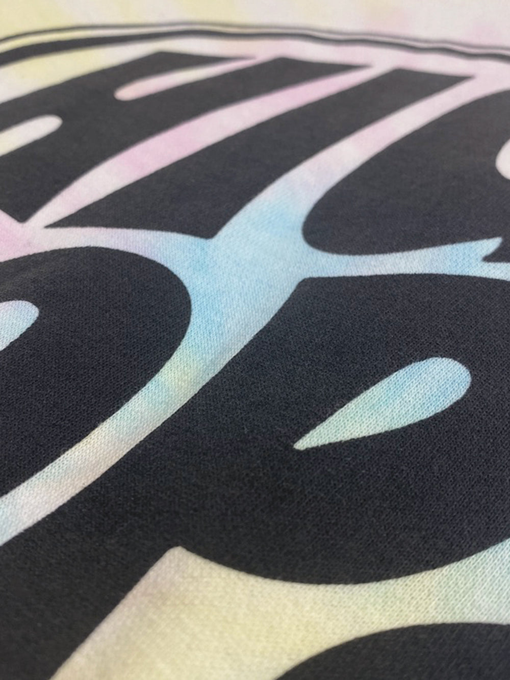 Bold plastisol screen print on a garment