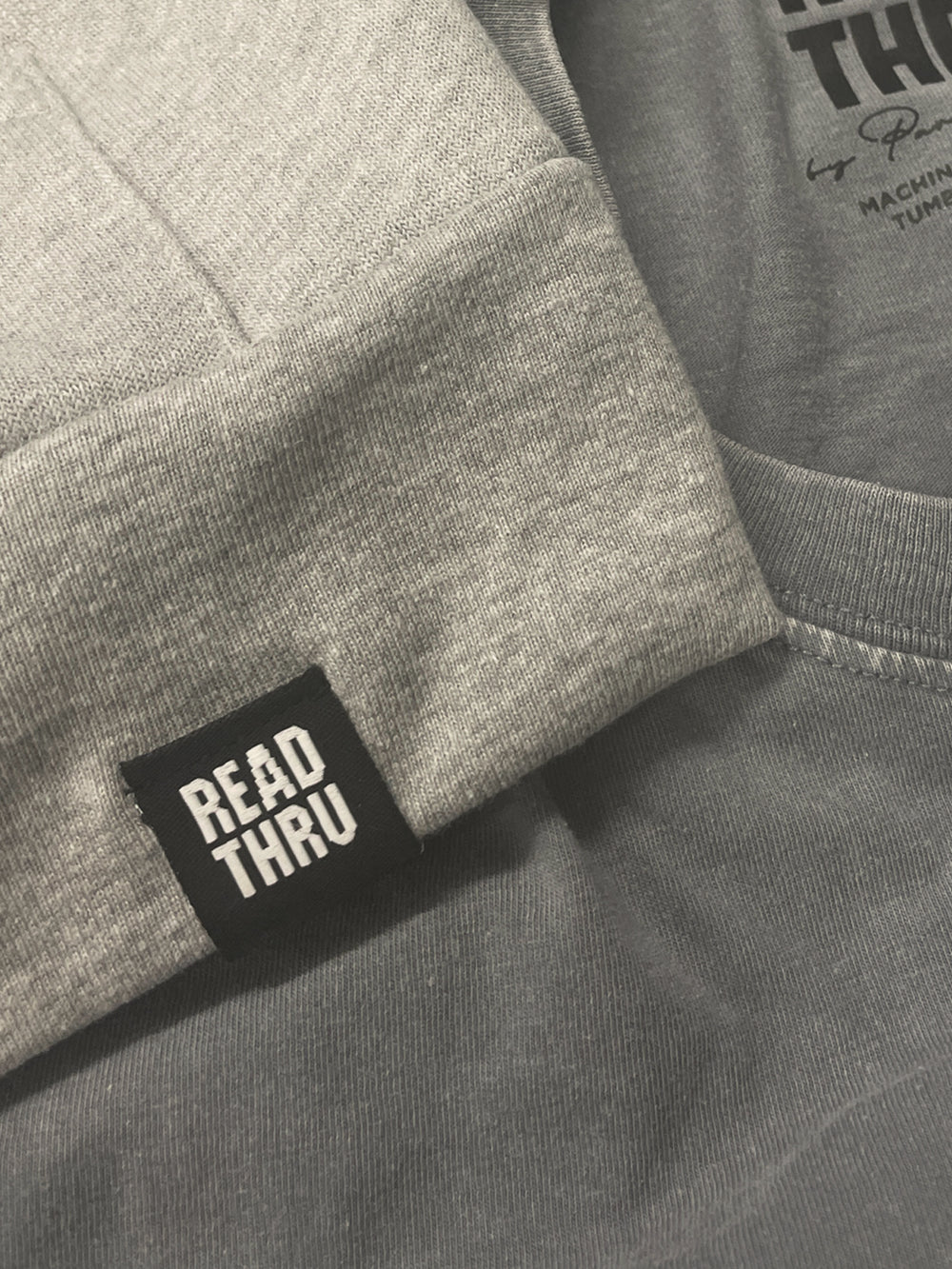 Woven hem tag on a knit garment