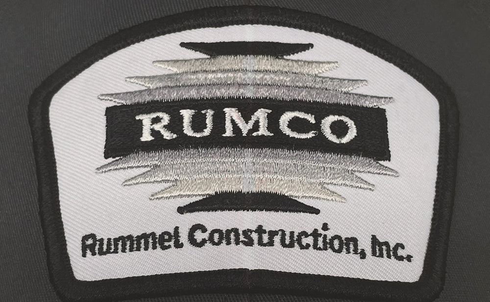 Embroidered patch on a trucker hat