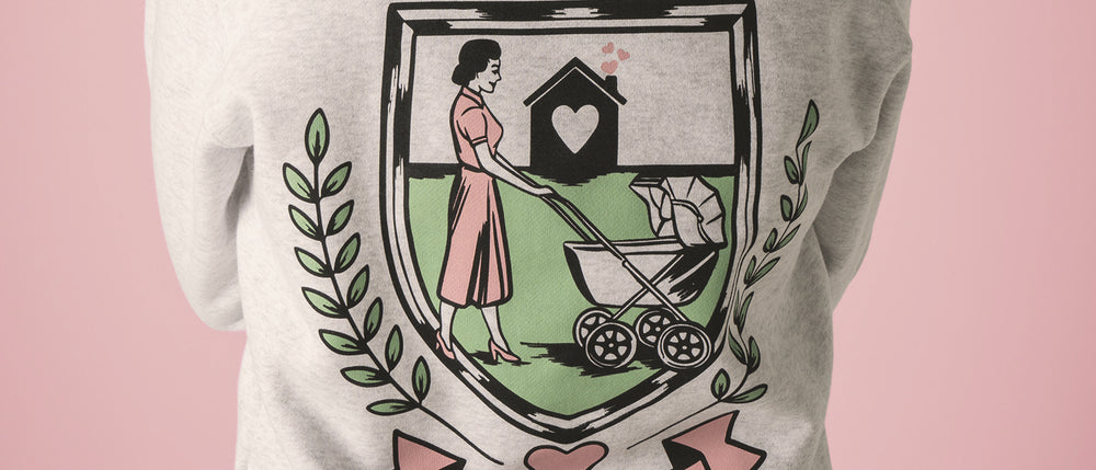 Crest design printed with high-opacity water-based ink on a light crewneck